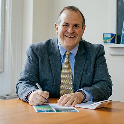 A photo of G. Dino Koff, Director of Financial Aid